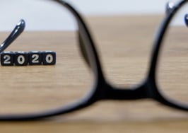 Looking through glasses to focus on the year 2020