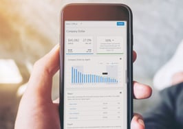 many holding smartphone looking at Lone Wolf Insights app