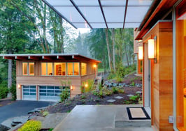 All-glass garage doors instantly breathe life into an old home