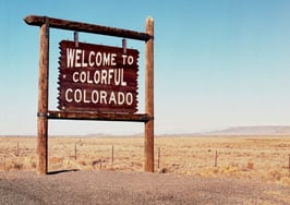 55-agent Denver indie affiliates with Corcoran