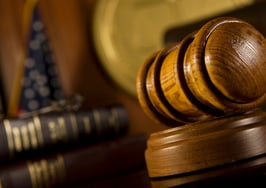 Compass faces yet another suit regarding recruiting tactics