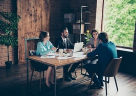 What creative solution does this top team leader use to win more business?