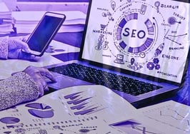 A person learning about SEO on their computer to signify the ultimate SEO guide for real estate agents.