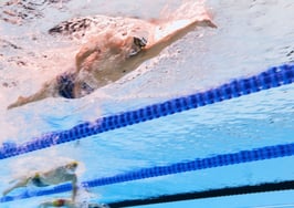 Century 21 agent earns bronze for US Paralympics swim team