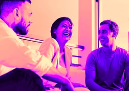 People in a rooftop bar meeting place, building new relationships.