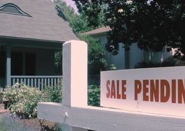 Home for sale sign, with sale pending