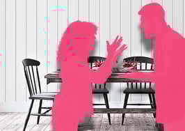 An silhouette of a man and a woman arguing in front of a kitchen table to represent formulating counteroffers to a lowball offer and negotiating concessions.
