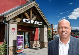 A picture of contributor Jimmy Burgess in front of a GNC store to symbolize his GNC formula for real estate agents.