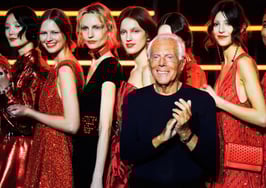 A photo of Giorgio Armani among fashion models to represent brokerage leadership lessons from Giorgio Armani.