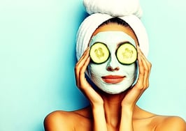 woman getting facial as a symbol of real estate agent self care