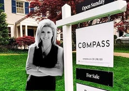 Cara Ameer and Compass lawn sign for Compass Anywhere merger questions