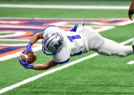 football player scoring a touchdown