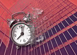 A clock disintegrating in front of a building to represent that time is running out for the future of MLSs.
