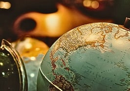 A globe to represent foreign buyer trends for 2025.