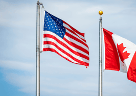 US and Canada flags for story about Canadian tariffs