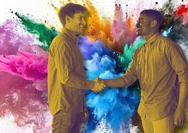 Two people shaking hands in front of an explosion of color to signify media outreach strategies for real estate.