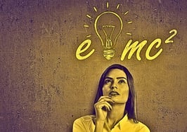 A woman with Einstein’s famous theory of relativity to signify Einstein real estate lessons.