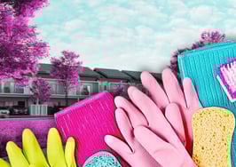 Cleaning gloves and sponges over a multifamily building to symbolize rental spring cleaning checklist.