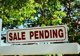 sale pending sign outside of home
