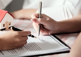 Compass sued by homebuyers over $475 transaction fee