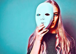 An image of a woman partially wearing a mask to signify how to protect client privacy and mask real estate client identity.