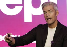 An image of Ryan Serhant who is discussing health insurance for real estate agents.