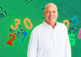 An image of Jimmy Burgess with numbers and sums in the background to represent real estate business growth strategy.