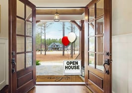 An image of a door open with open house balloons outside to represent Krys Benyamein's open house launch plan.