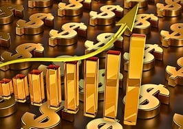 Money sings under an upward trending chart to represent independent brokerage growth.