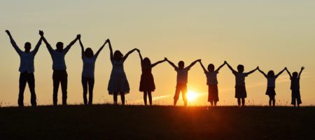 A group of people holding hands