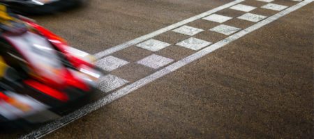A race car crossing the finish line
