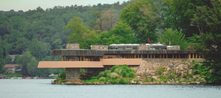 An island home inspired by Frank Lloyd Wright in New York to be marketed as corporate retreat
