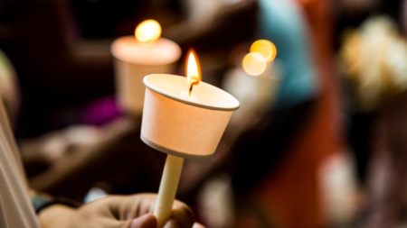 A candle lit vigil to represent real estate agent deaths.