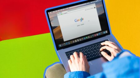 A picture of someon googling something to show how to set up your Google Business Profile in real estate.