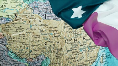 A map of China with the Texas flag draped over it