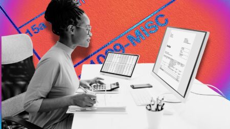 A woman working at a computer symbolizing how to set up a new real estate business.