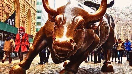 picture of Wall Street bull statue, showing the role the market plays in retirement for real estate agents