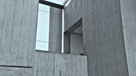 gray area with columns to represent challenges of real estate leadership