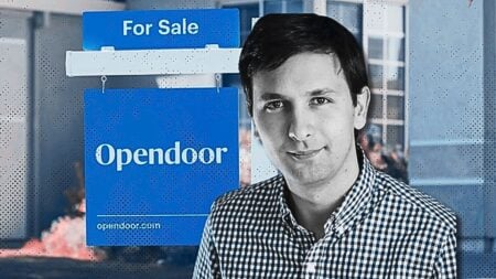 A picture of the new CEO in front of an Opendoor sign for an article about Opendoor's resurrection.