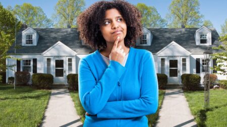 A woman in front of a home asking herself the rent vs. buy question.