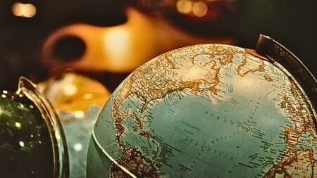 A globe to represent foreign buyer trends for 2025.