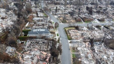 In an aerial view, neighborhoods lie in ruins after the Palisades Fire on January 30, 2025 in Pacific Palisades, California. (Photo by Qian Weizhong/VCG via Getty Images)
