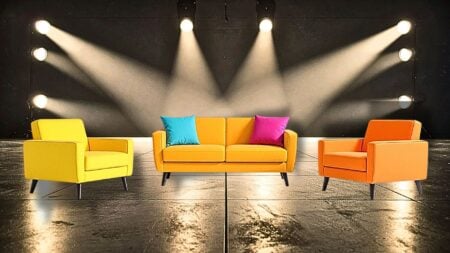 furniture on a lit stage to represent home staging