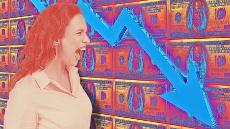 A woman staring at a wall of cash with a downward arrow to symbolize recession tips for real estate agents.