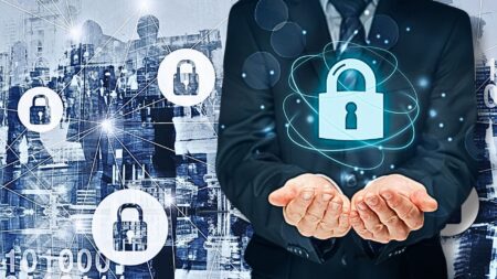 A picture of a man holding a digital lock in front of a digital background to signify deepfakes, AI slop and virtual staging.