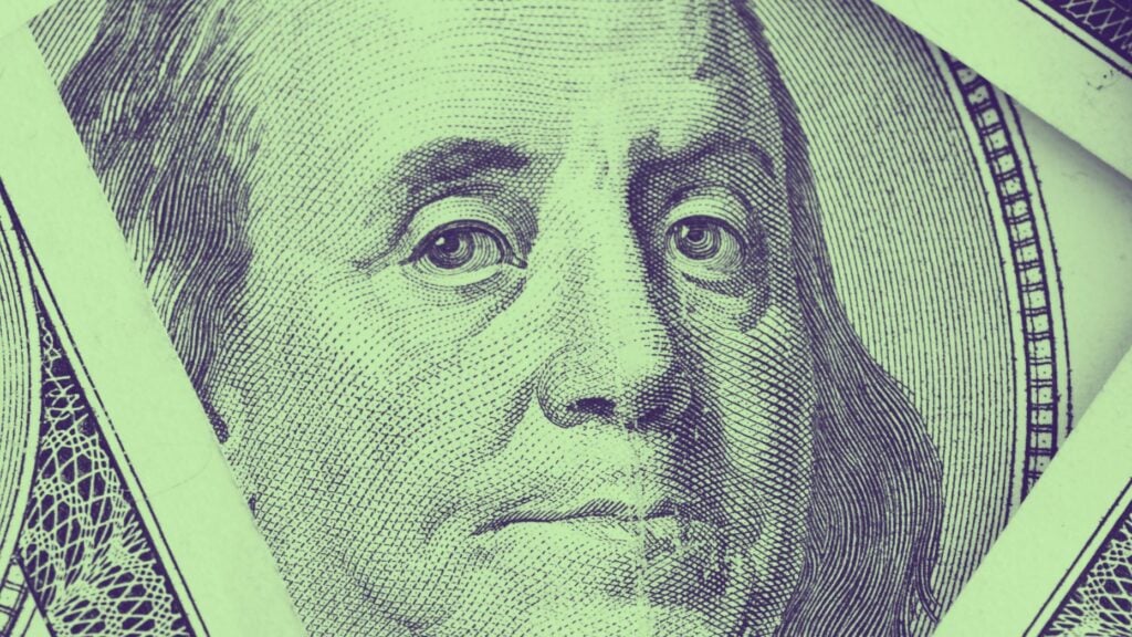 An image of a $100 bill to represent real estate budget truths.