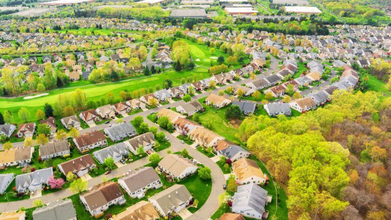 President Trump argues for keeping home prices high, borrowing costs low