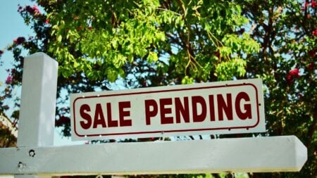 sale pending sign outside of home