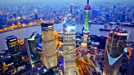 Aerial view of high-rise buildings in Shanghai representing Christie's International Real Estate Shanghai affiliate opening.