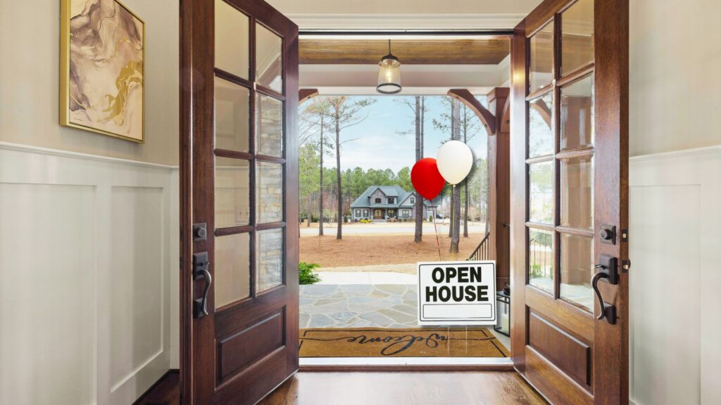 An image of a door open with open house balloons outside to represent Krys Benyamein's open house launch plan.